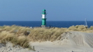 Dünen, Sand, Meer und das Leuchtfeuer auf der West-Mole