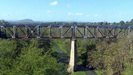 UNTERWEGS - eine Eisenbahnbrücke über den Fluß Contramaestre im gleichnamigen Ort
